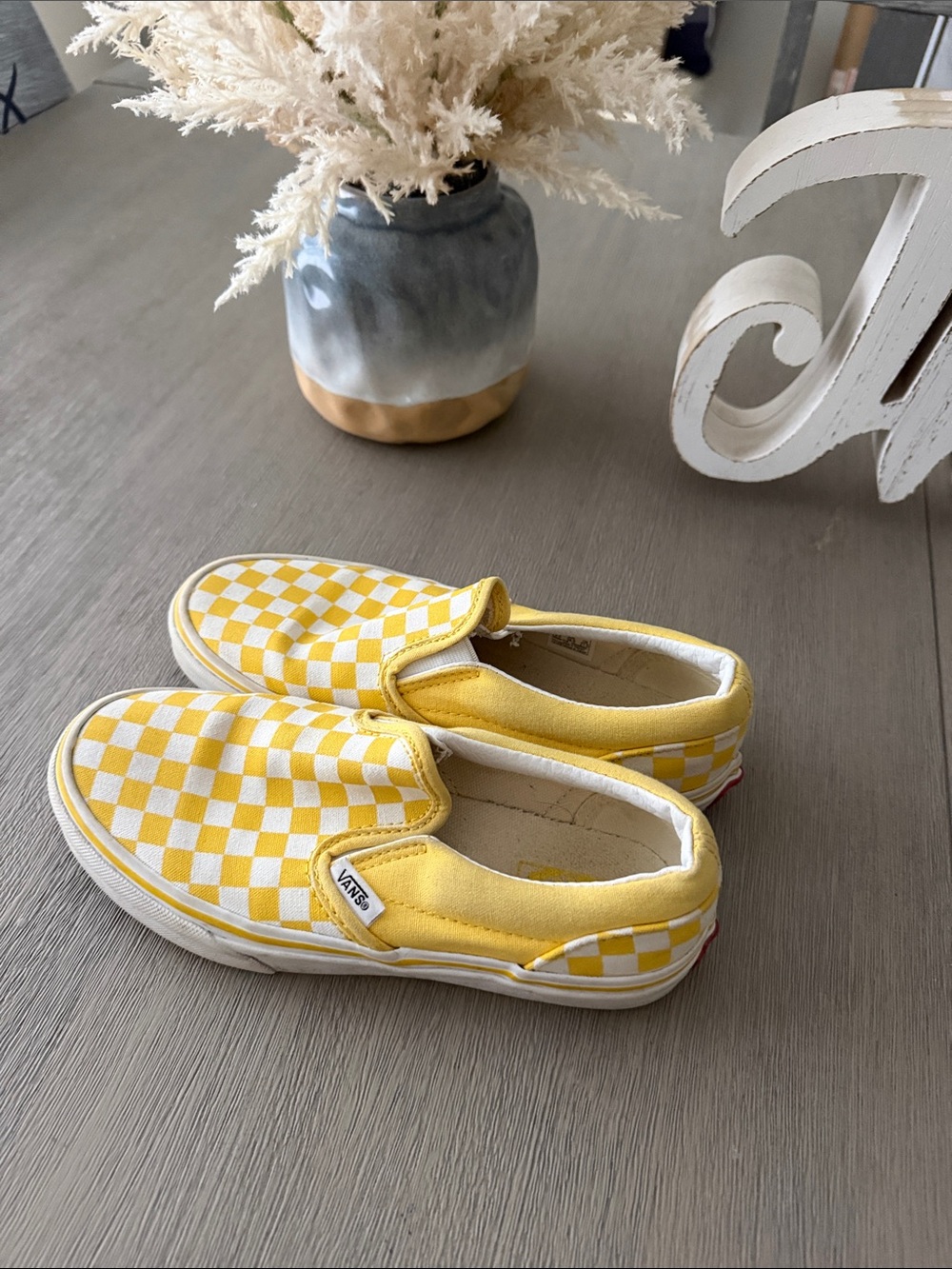 Vans Kids Yellow and White Checkerboard Slip-On Sneakers